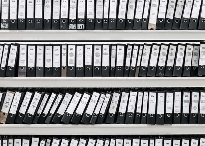 Binders on shelf