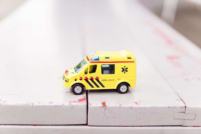 Yellow toy ambulance